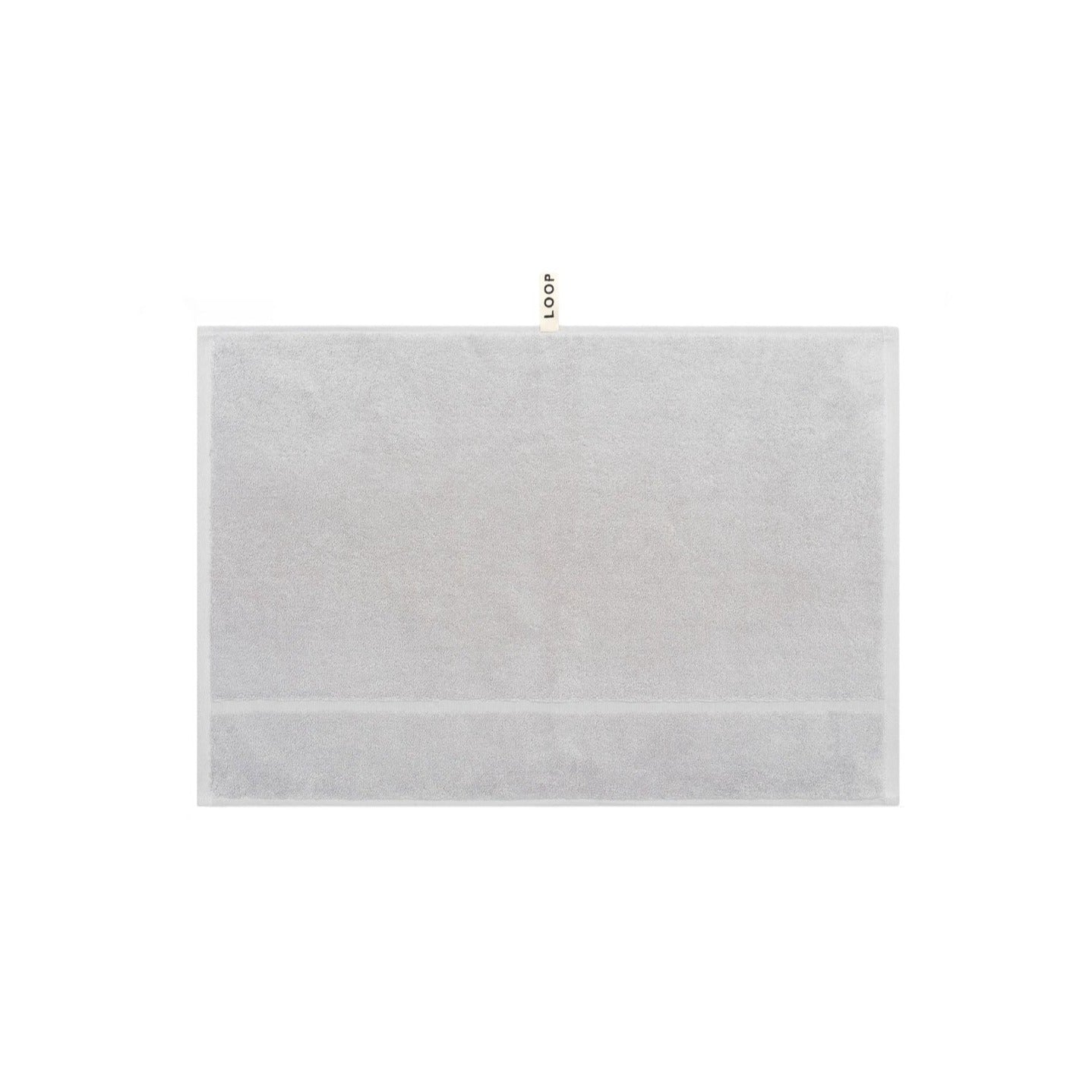 LOOP HOME stone hand towel folded showing bold stripe pattern