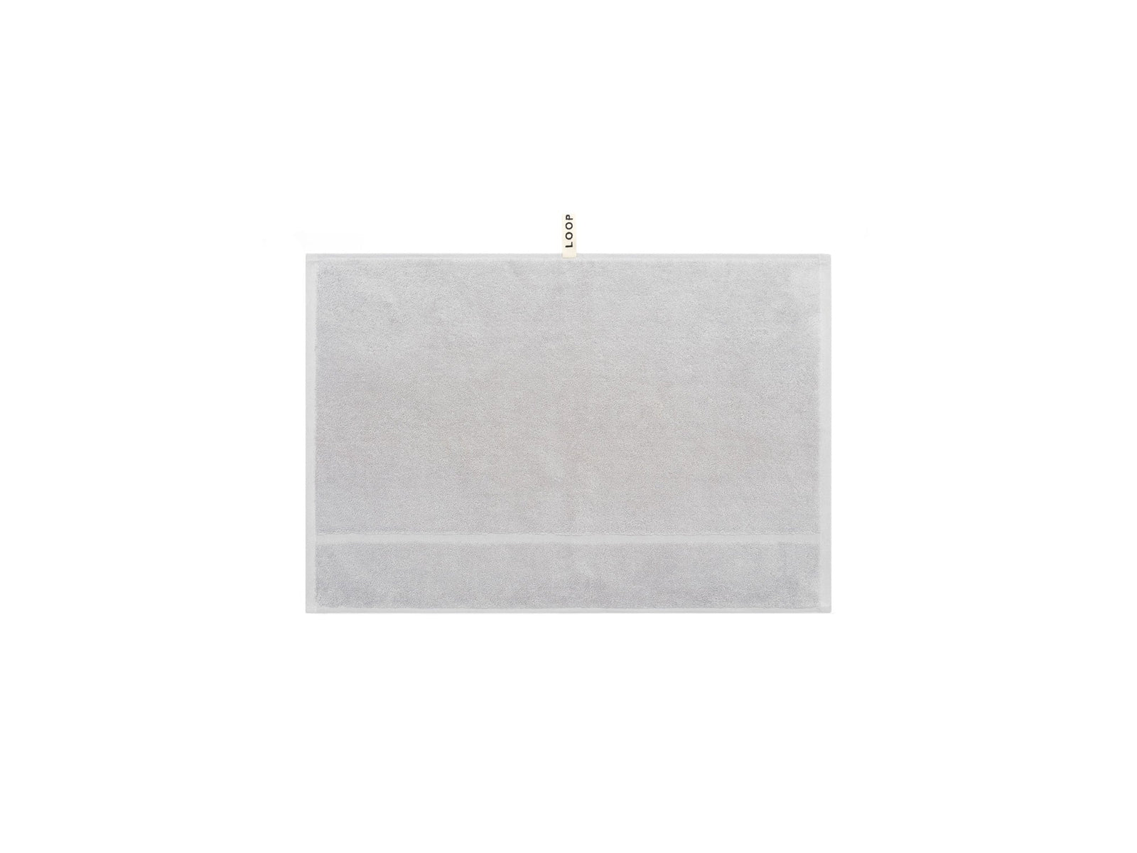 LOOP HOME stone hand towel folded showing bold stripe pattern