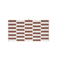 LOOP HOME cobalt and ivory bath towel folded on plain background