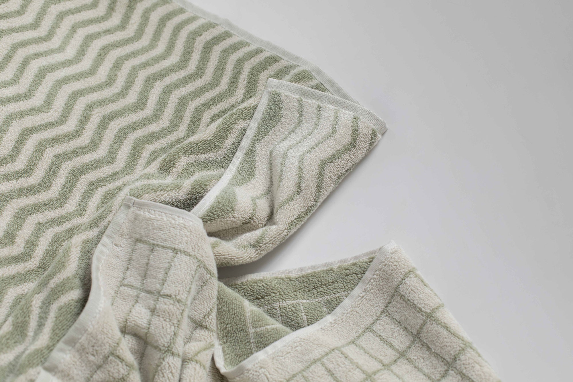 organic cotton bath towels in sage and sand