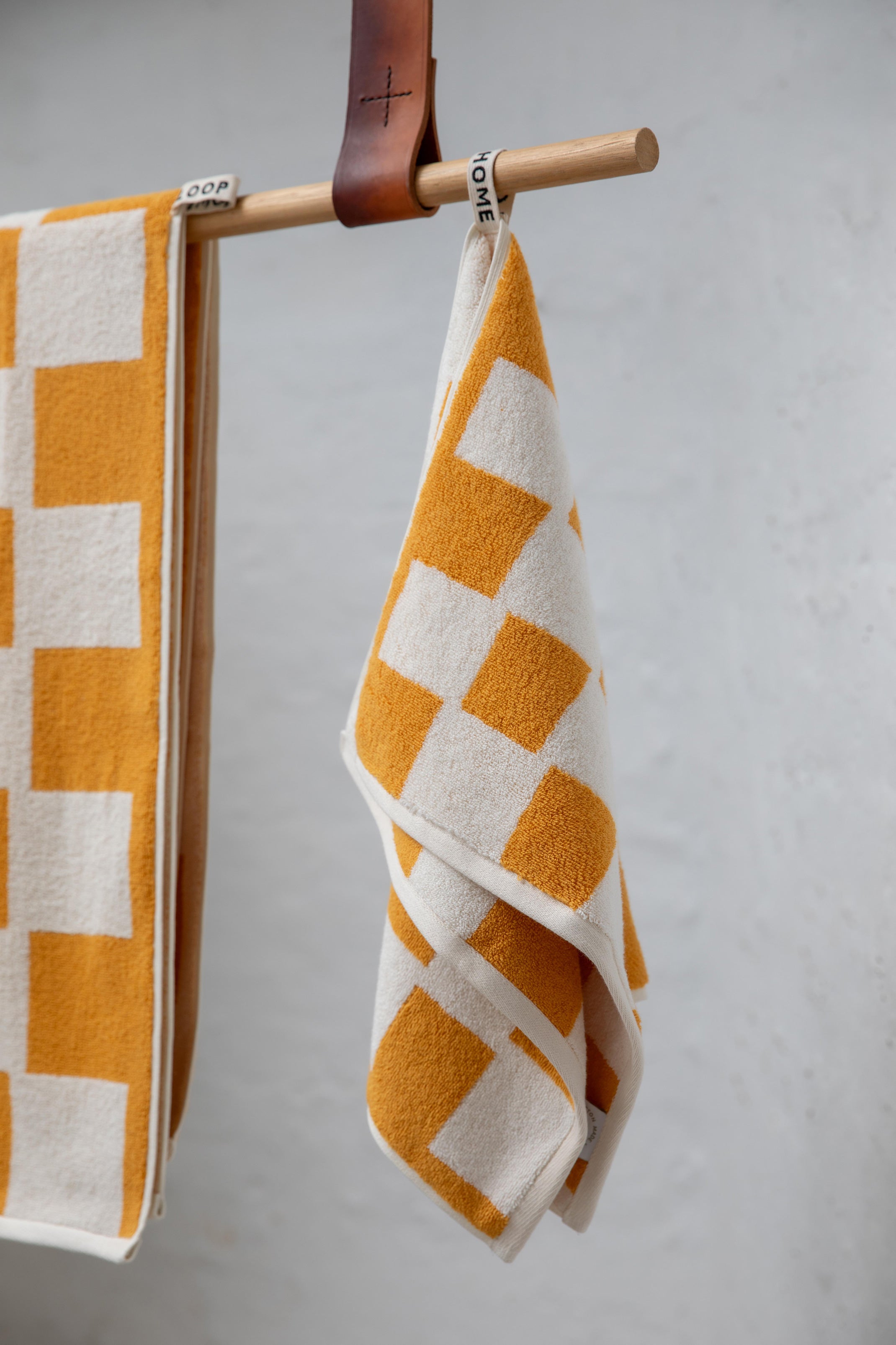 Loop Home organic cotton towels in a contemporary bathroom interior