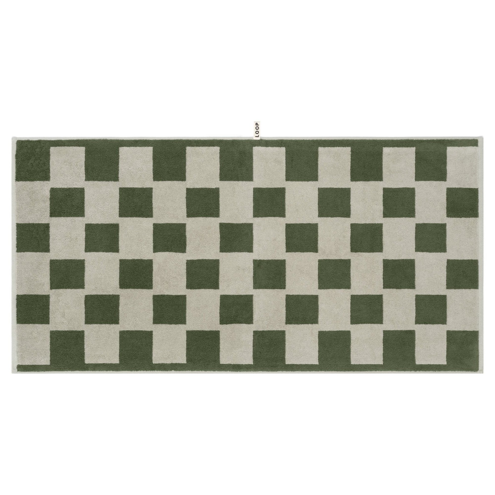 LOOP HOME forest and sage bath towel folded showing brick pattern