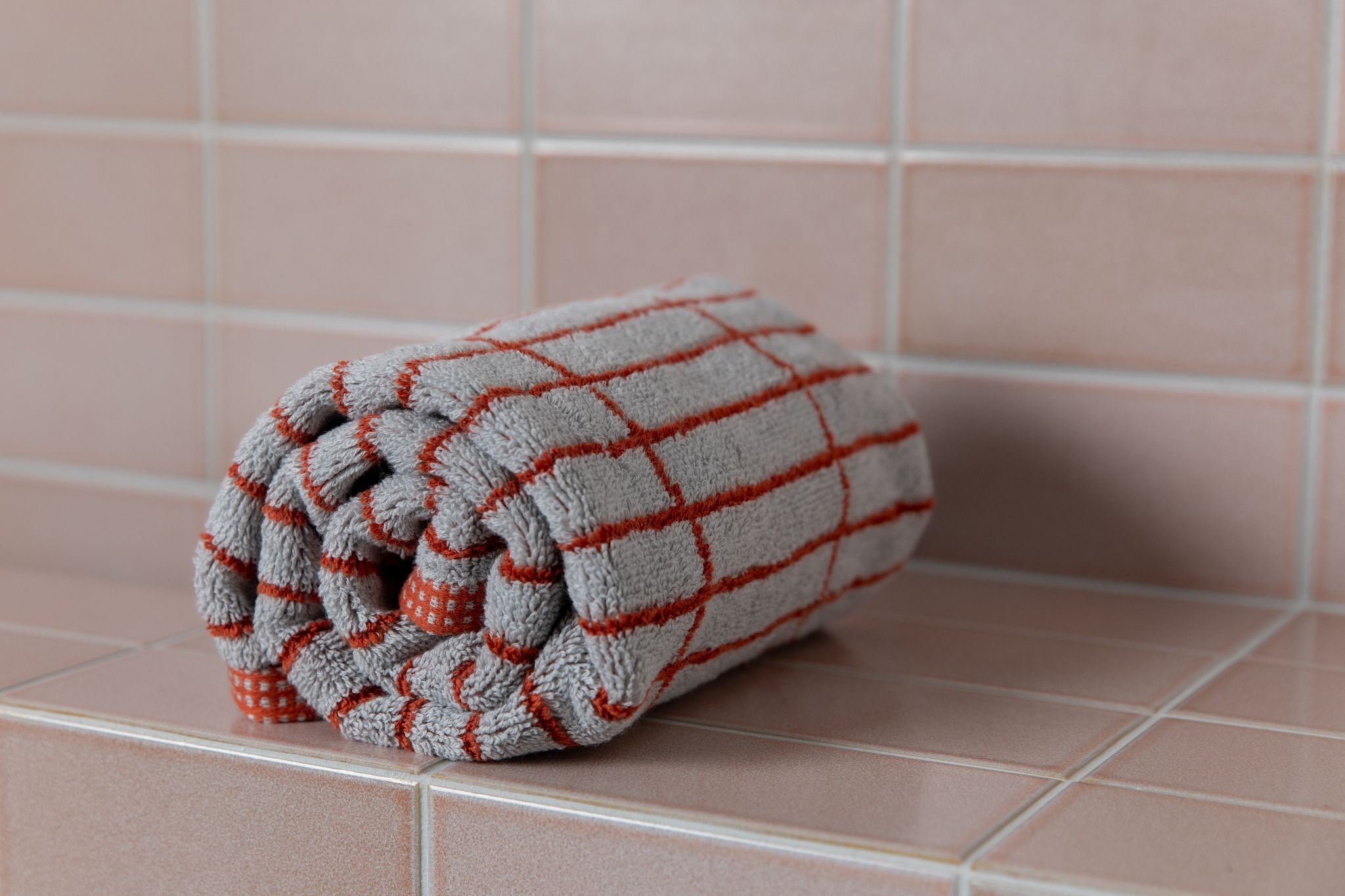 organic cotton bath towels in terracotta and stone